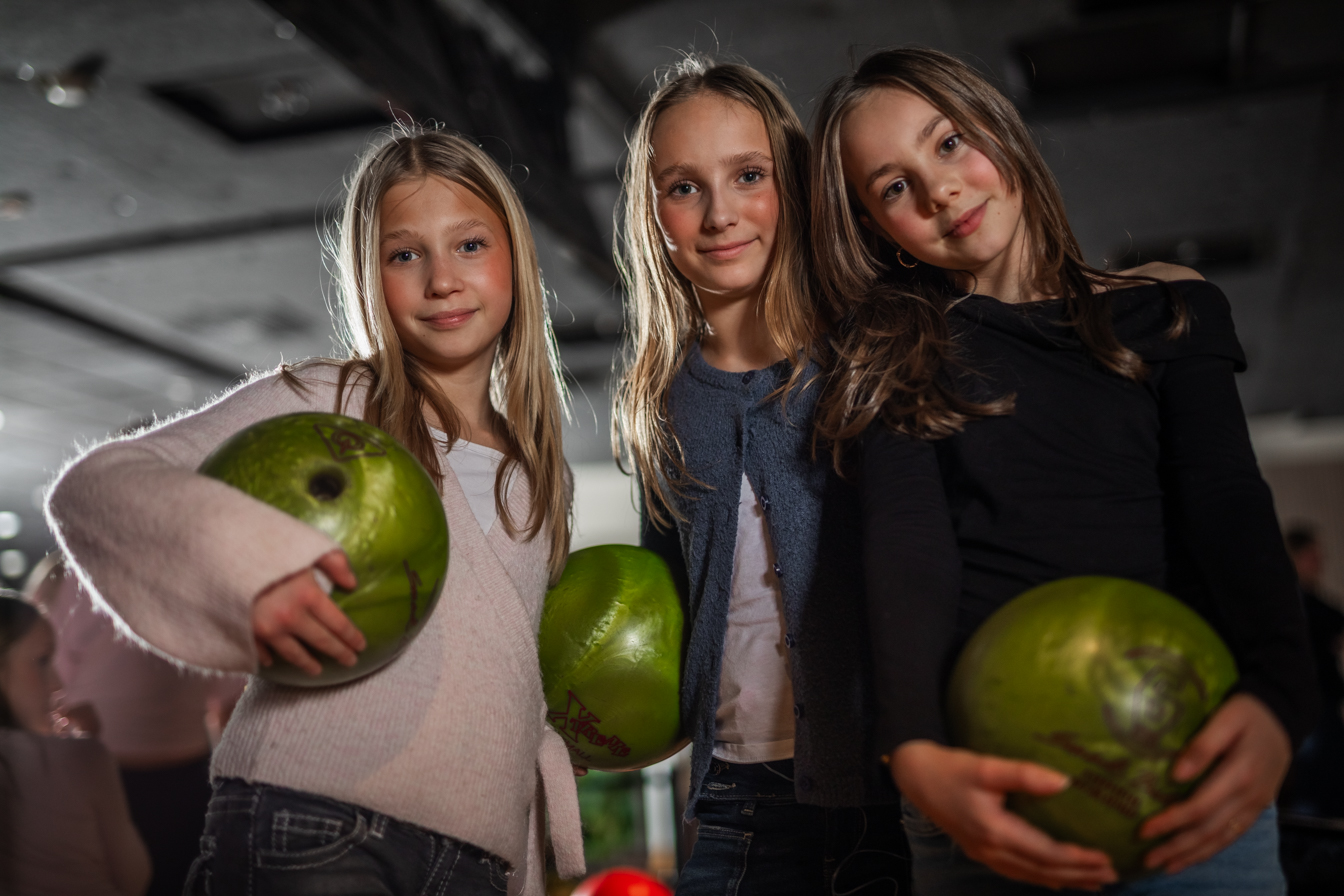 group of kids in bowling alley